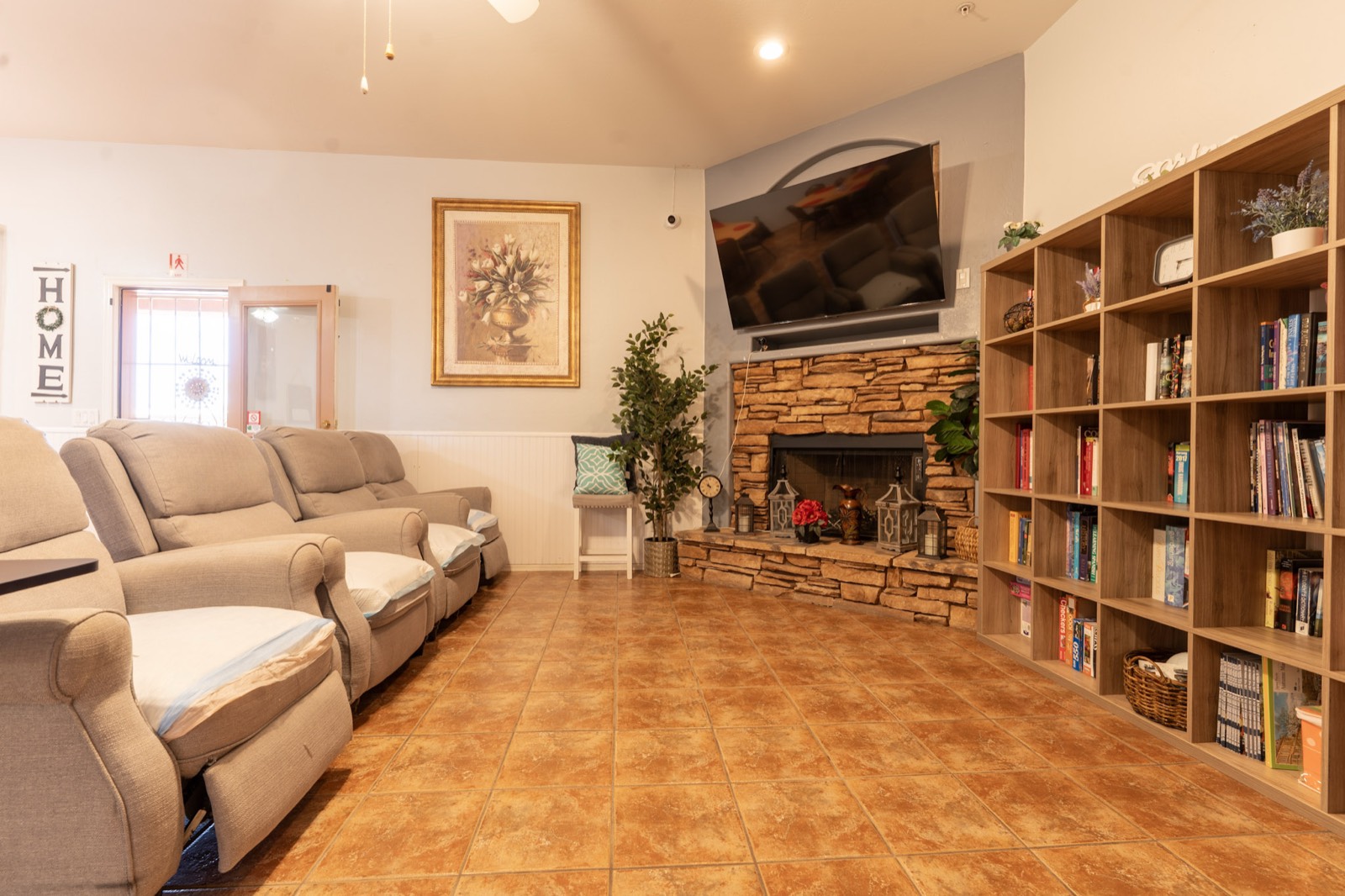A comfortable living room with recliners and a fireplace at Grace Hill Ranch